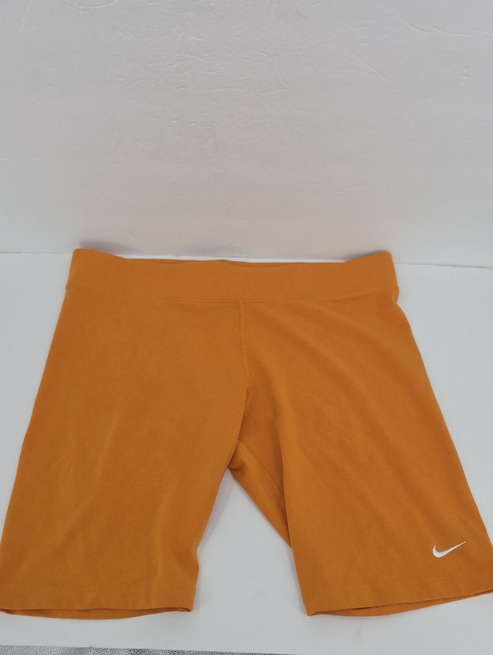 Nike Women's Burnt Orange Athletic Bike Shorts with White Swoosh